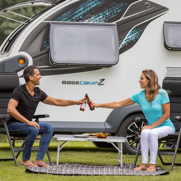 2025 Swift Basecamp Couple Sitting Outside Drinks