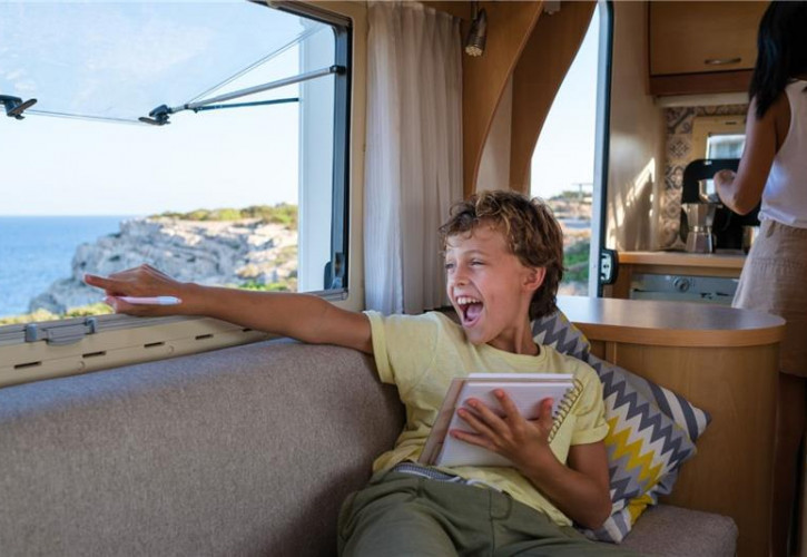 boy enjoying the motorhome